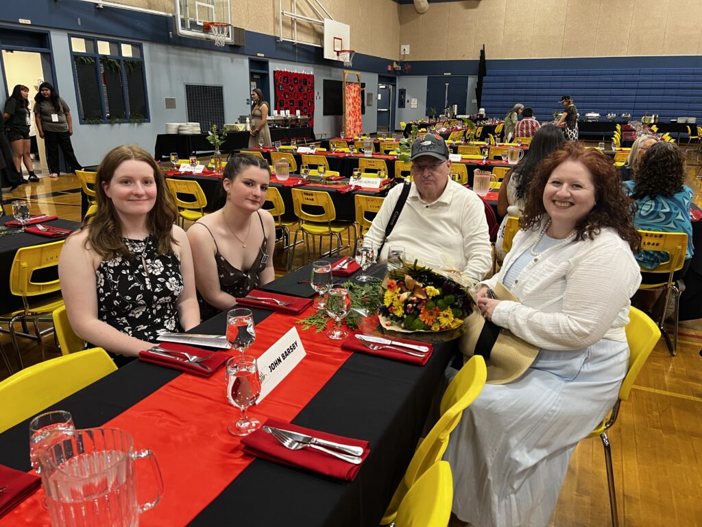 one of our families at a dining table