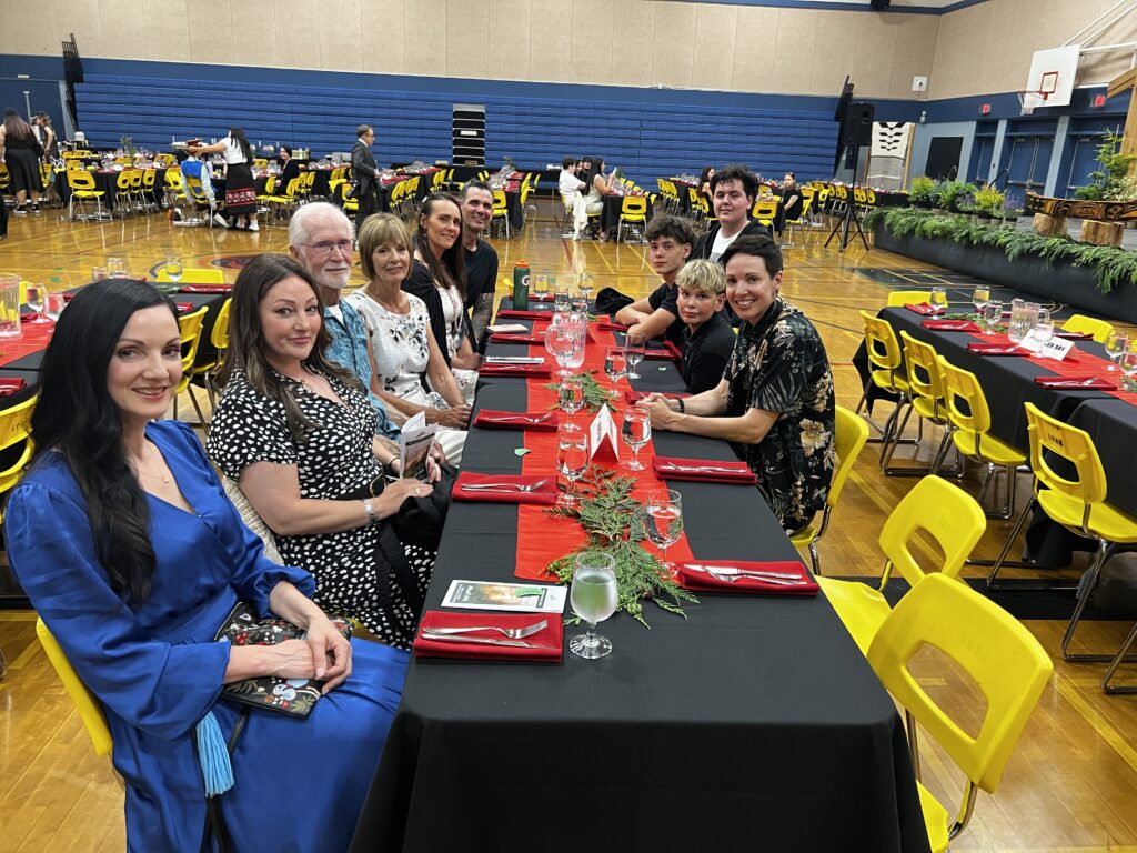 a large family at a dining table
