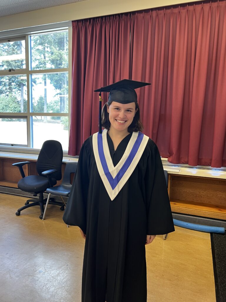 Island ConnectED grad smiling to camera