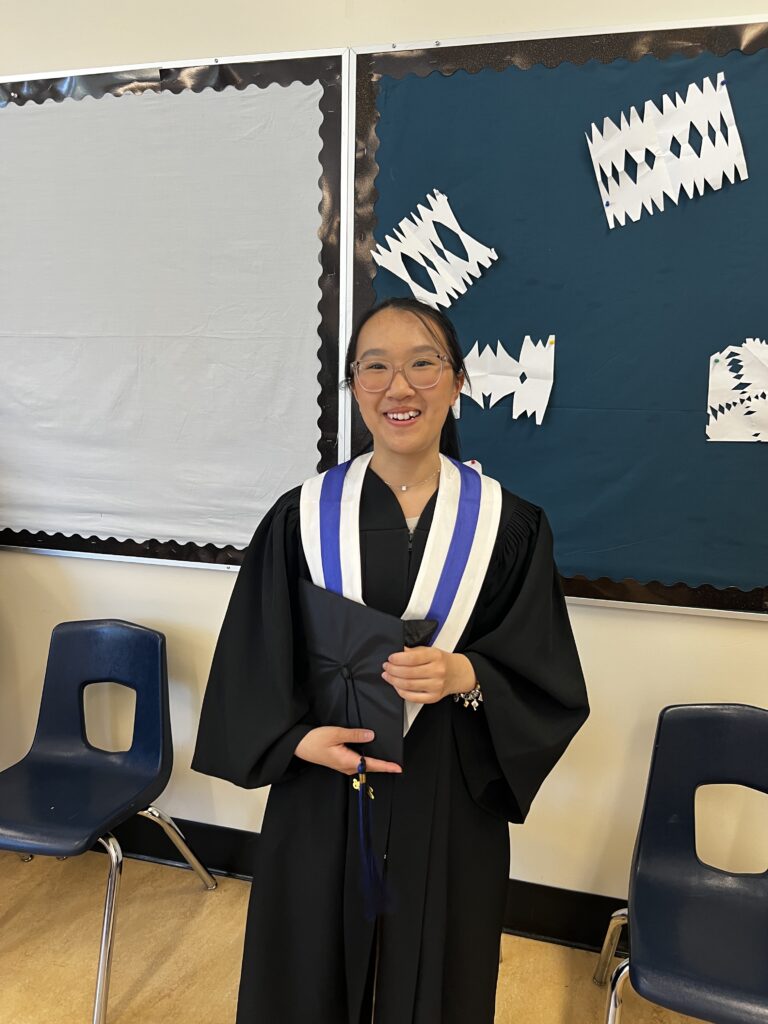 Island ConnectED grad smiling to camera
