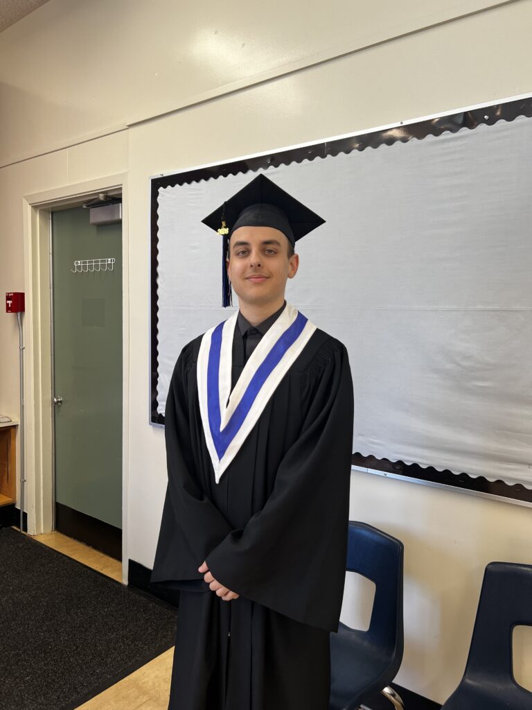 Island ConnectED grad smiling to camera