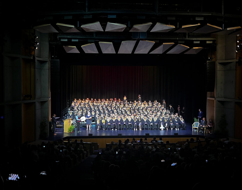 Wellington grads on stage for their graduation
