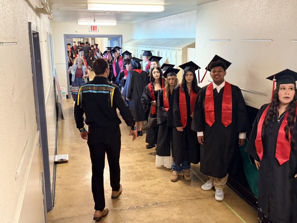 Learning Alternatives graduation ceremony - students line up in hallway prior to ceremony